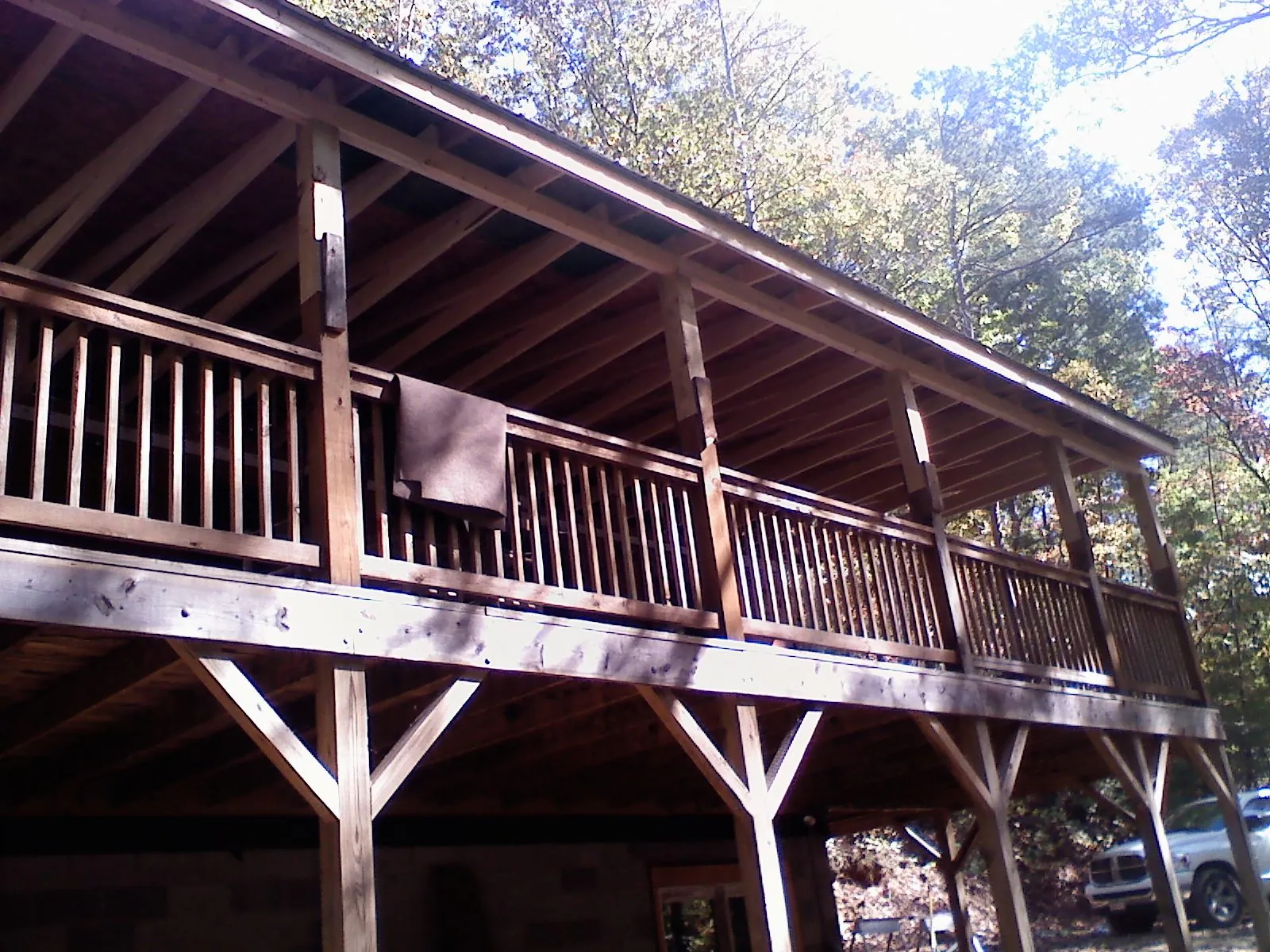 Timber framing under a new elevated porch and deck — Roof Leak Repair in Westmoreland by Roofing Brothers